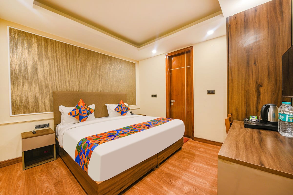 Premium kamer | Lakens van Egyptisch katoen, luxe beddengoed, een kluis op de kamer