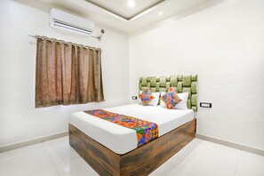 Egyptian cotton sheets, premium bedding, in-room safe, free WiFi - Fabhotel Prime Krishna Inn Resort (Ratu)