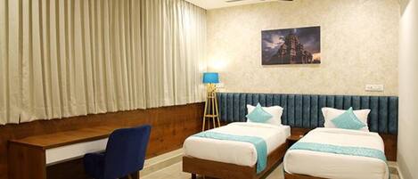 Habitación Deluxe | Sábanas de algodón egipcio, ropa de cama de alta calidad, wifi gratis