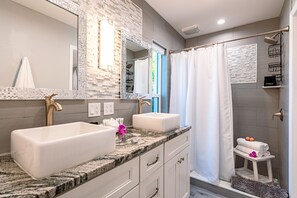 Shower, hair dryer, towels