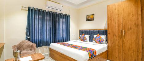 Deluxe kamer | Lakens van Egyptisch katoen, luxe beddengoed, een kluis op de kamer