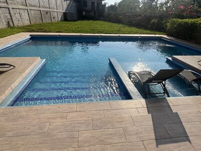 Stunning 5 bedroom house all ensuite with a beautiful pool and backyard.