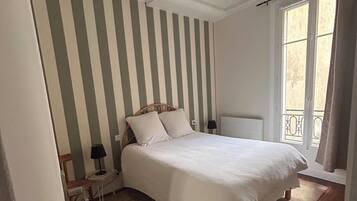 2 bedrooms, desk, iron/ironing board, travel crib