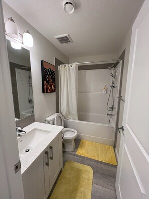 Hair dryer, towels, soap, toilet paper