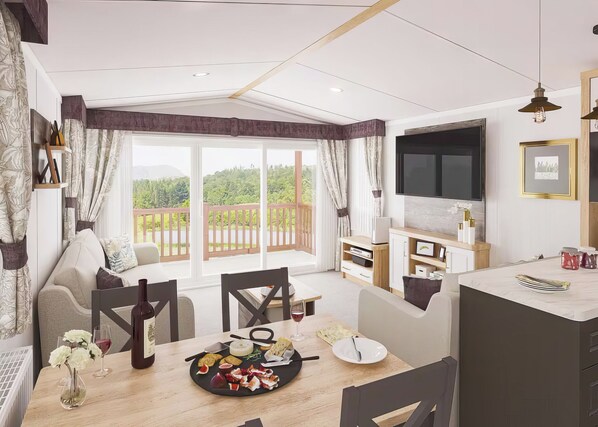 TV - Three bedroom caravan, sleeping six people, perfect for relaxing by the coast. (Clarach)