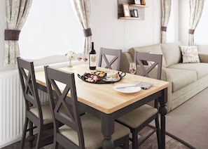 Dining - Three bedroom caravan, sleeping six people, perfect for relaxing by the coast. (Clarach)