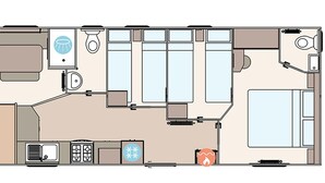 Ein Hotelgrundriss mit Küche, Essbereich und mehreren Schlafzimmern.