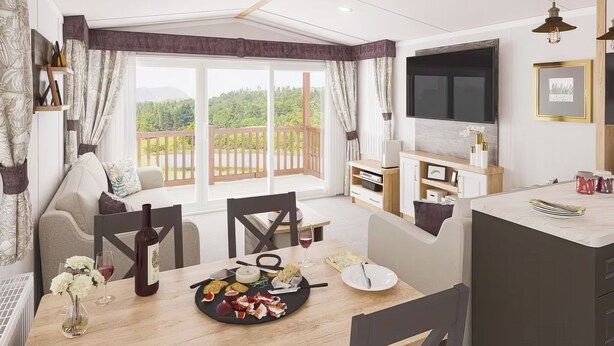 A modern living room with a dining area, large windows, a TV, and a kitchen area.