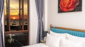 Habitación Deluxe | Sábanas de algodón egipcio, ropa de cama de alta calidad y edredón