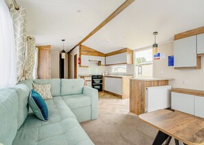 Living area - 12ft-wide very comfortable and spacious caravan with one double and one twin. (Mablethorpe)