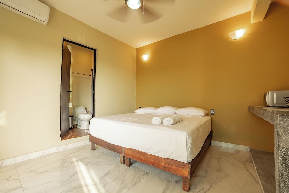 Habitación superior, varias camas | 1 dormitorio y wifi gratis
