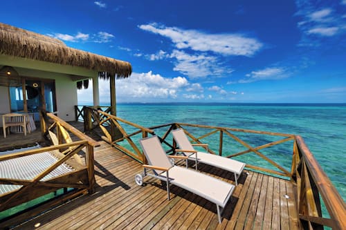Lagoon Suite with Private Pool | Frette Italian sheets, premium bedding, down comforters, minibar