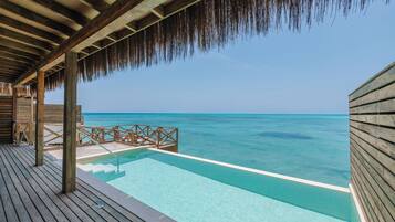 Lagoon Suite with Private Pool | Frette Italian sheets, premium bedding, down duvets, minibar