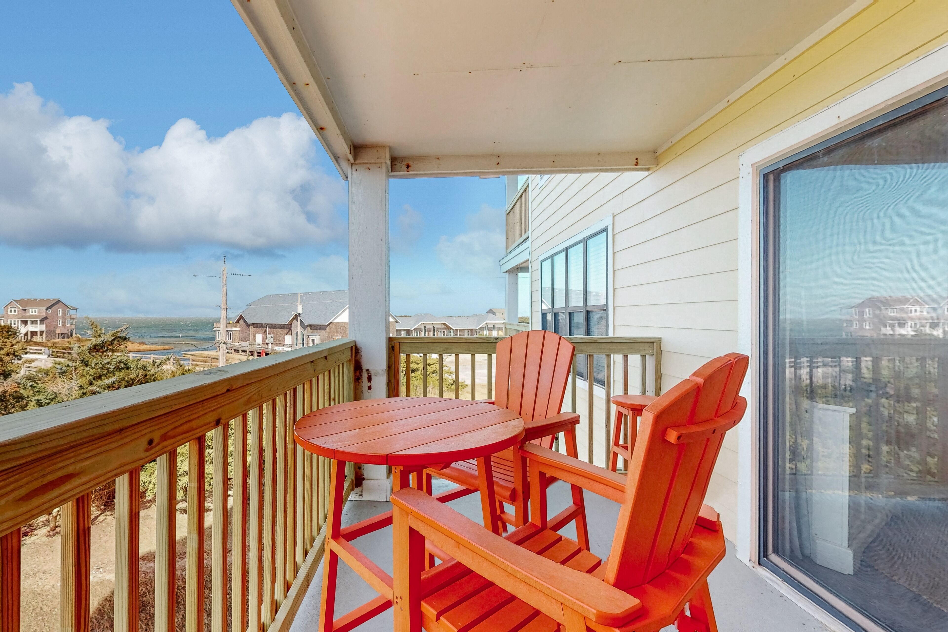 Water-view condo near beach & ocean with private dock, streaming, pool, BBQ, W/D