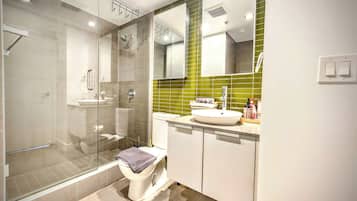 Shower, hair dryer, towels, soap