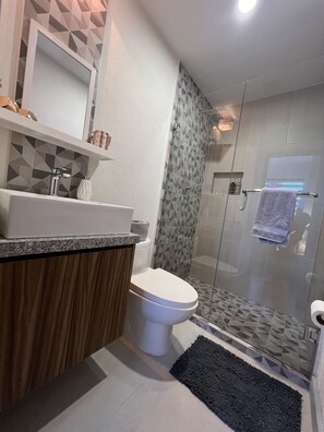 Shower, hair dryer, towels, soap