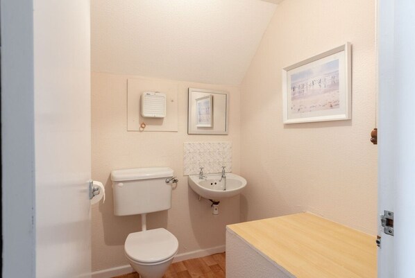 Downstairs toilet, convenient extra facilities at this four-bedroom pet-friendly beach house sleeping eight in Rhosneigr, Anglesey