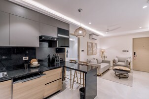 One Bedroom Suite | Private kitchen | Coffee/tea maker, electric kettle