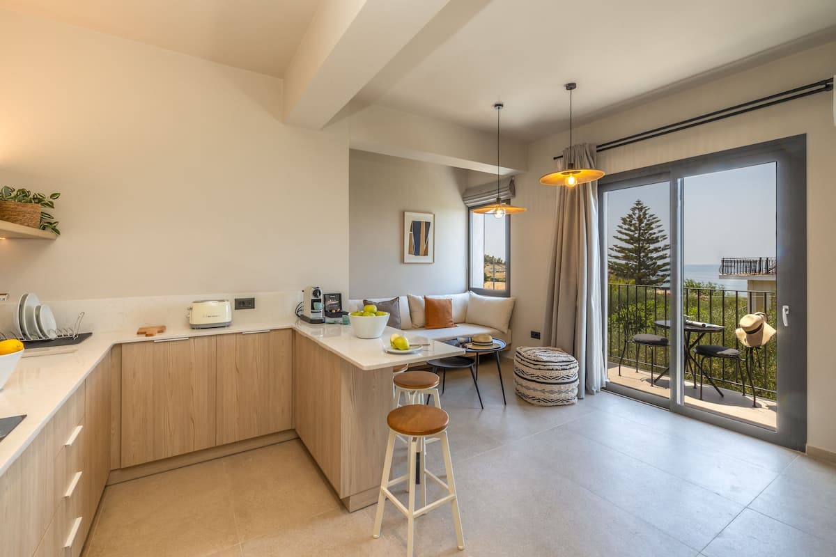 Suite, vista al mar | 1 habitación, ropa de cama de alta calidad y camas con efecto memoria