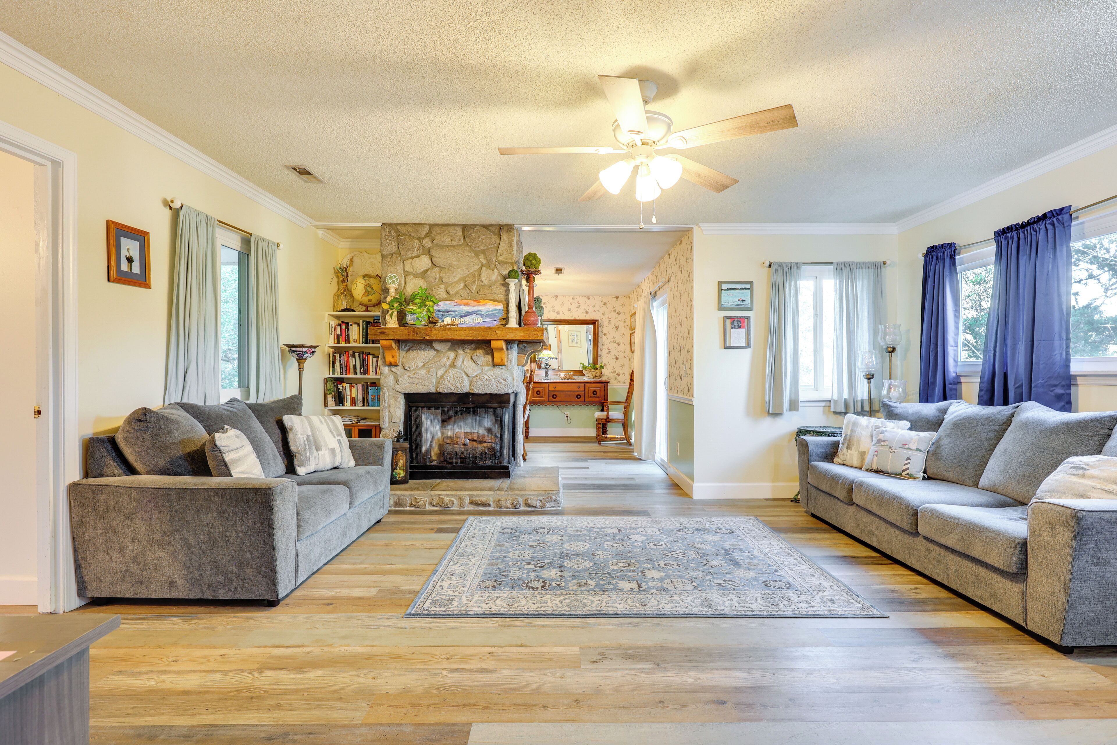 TV, fireplace, books