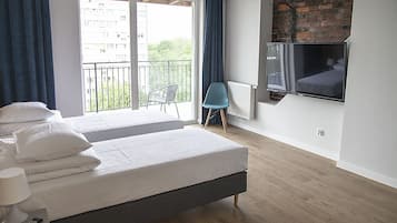 Chambre Quadruple Standard | Literie hypoallergénique, espace de travail pour ordinateur portable