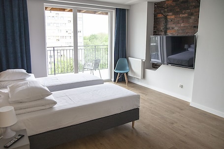 Standard Quadruple Room | Hypo-allergenic bedding, laptop workspace, blackout drapes
