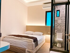 Deluxe Room | 1 bedroom, desk, laptop workspace, soundproofing - Kartiko Palagan Eksklusif Yogyakarta (Depok)