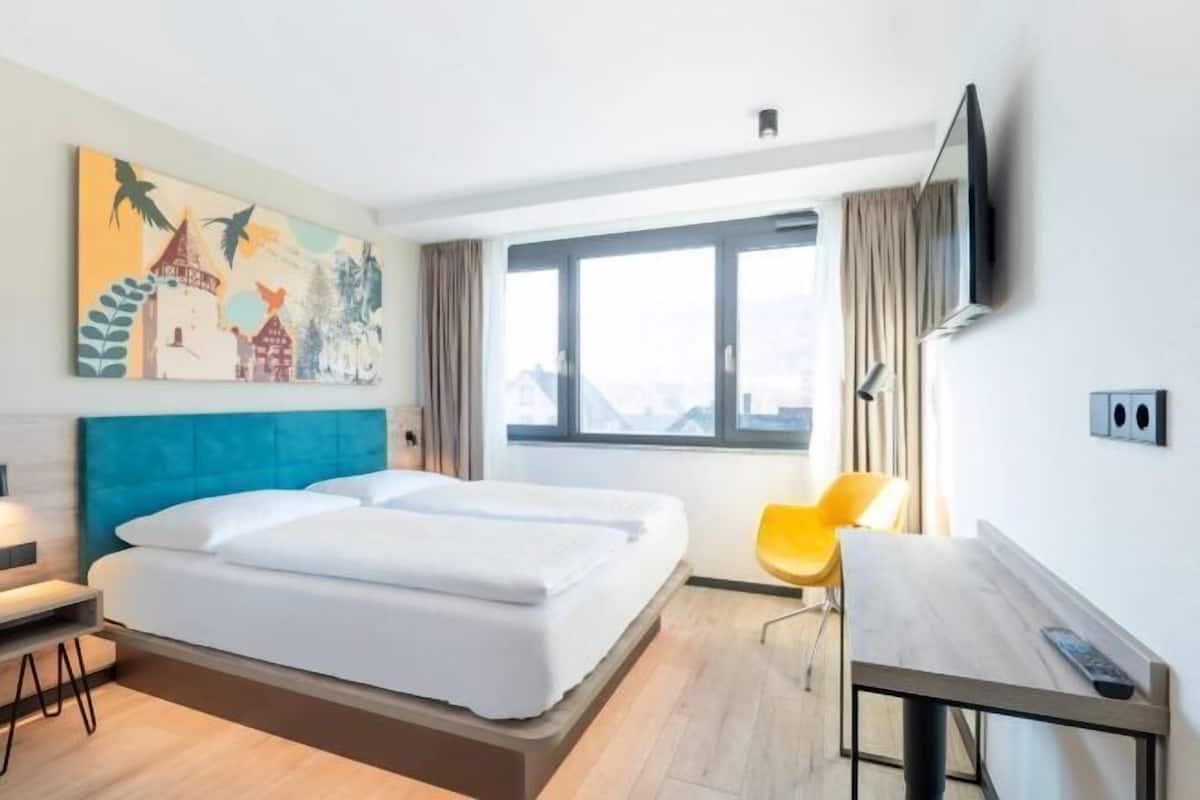 Blackout curtains, soundproofing, free WiFi, bed sheets