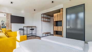 Family Room, Non Smoking, Kitchenette | Blackout drapes, soundproofing, WiFi (free), bed sheets