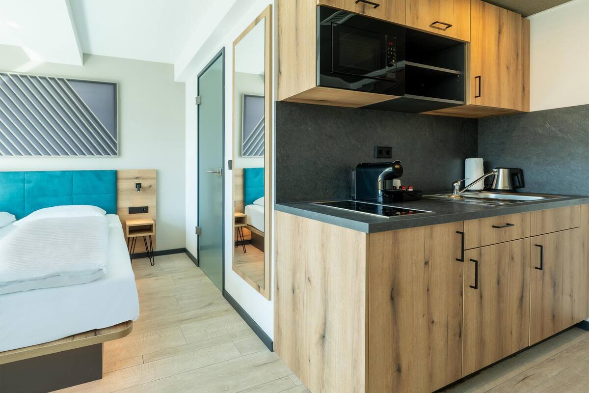 Chambre Double Premium, non-fumeurs, coin cuisine | 1 chambre, rideaux occultants, chambres insonorisées, Wi-Fi gratuit