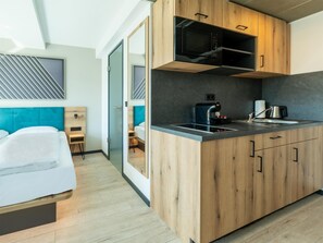 Kahden hengen premium-huone, tupakointi kielletty, keittotila | 1 makuuhuone, pimennysverhot, äänieristys, ilmainen Wi-Fi