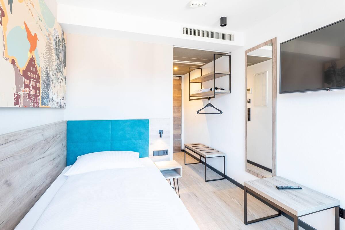 Chambre Simple, non-fumeurs | 1 chambre, rideaux occultants, chambres insonorisées, Wi-Fi gratuit