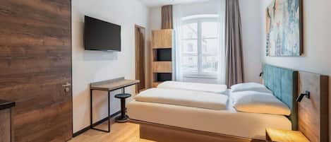 Blackout drapes, soundproofing, WiFi (free), bed sheets