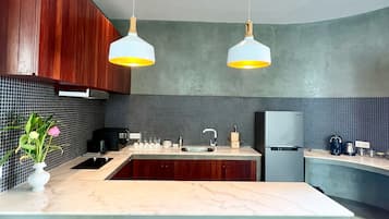 Signature Suite, 1 Bedroom, Balcony, Pool View | Private kitchenette | Full-sized fridge, microwave, stovetop, electric kettle