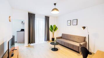 Classic Apartment | Living area | Flat-screen TV