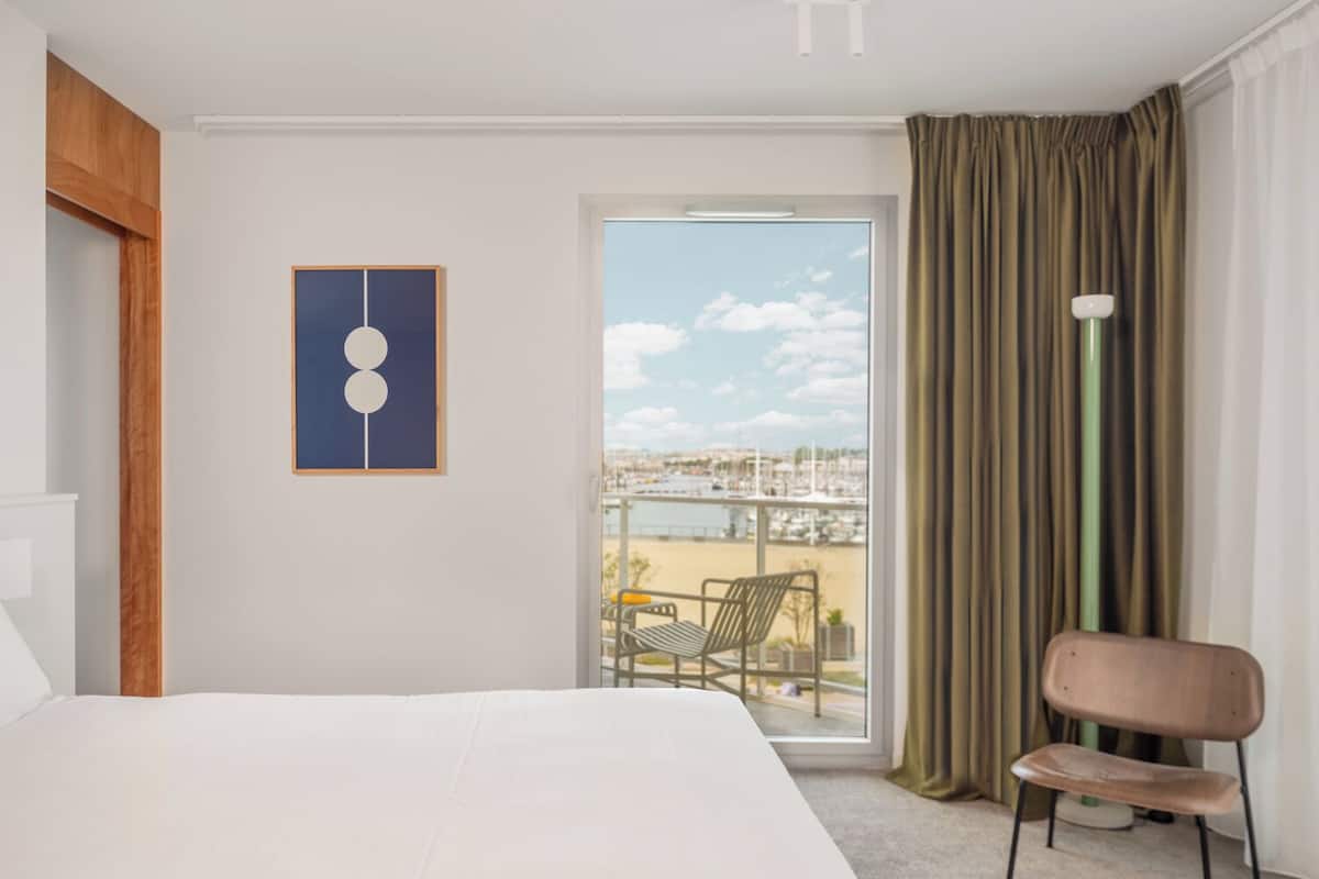 Suite familiar, balcón, vista al puerto | Vista desde la habitación