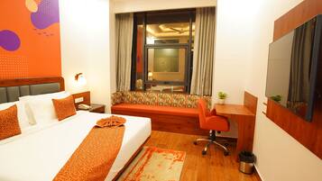 Habitación ejecutiva | Ropa de cama de alta calidad y minibar