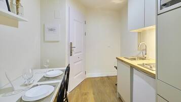Mini-fridge, microwave, stovetop, espresso maker