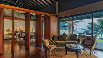 Presidential Penthouse, Patio, Ocean View | Living area | 55-inch flat-screen TV with satellite channels