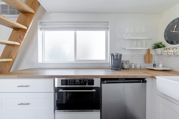 Fridge, microwave, coffee/tea maker, toaster