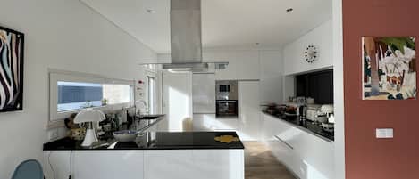 Coffee/tea maker, fridge, microwave, oven