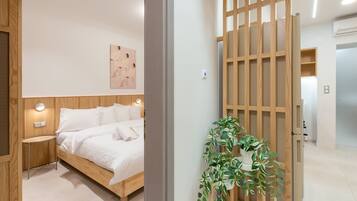 Apartemen Kota | 2 kamar tidur, seprai antialergi, Wi-Fi gratis, dan seprai linen