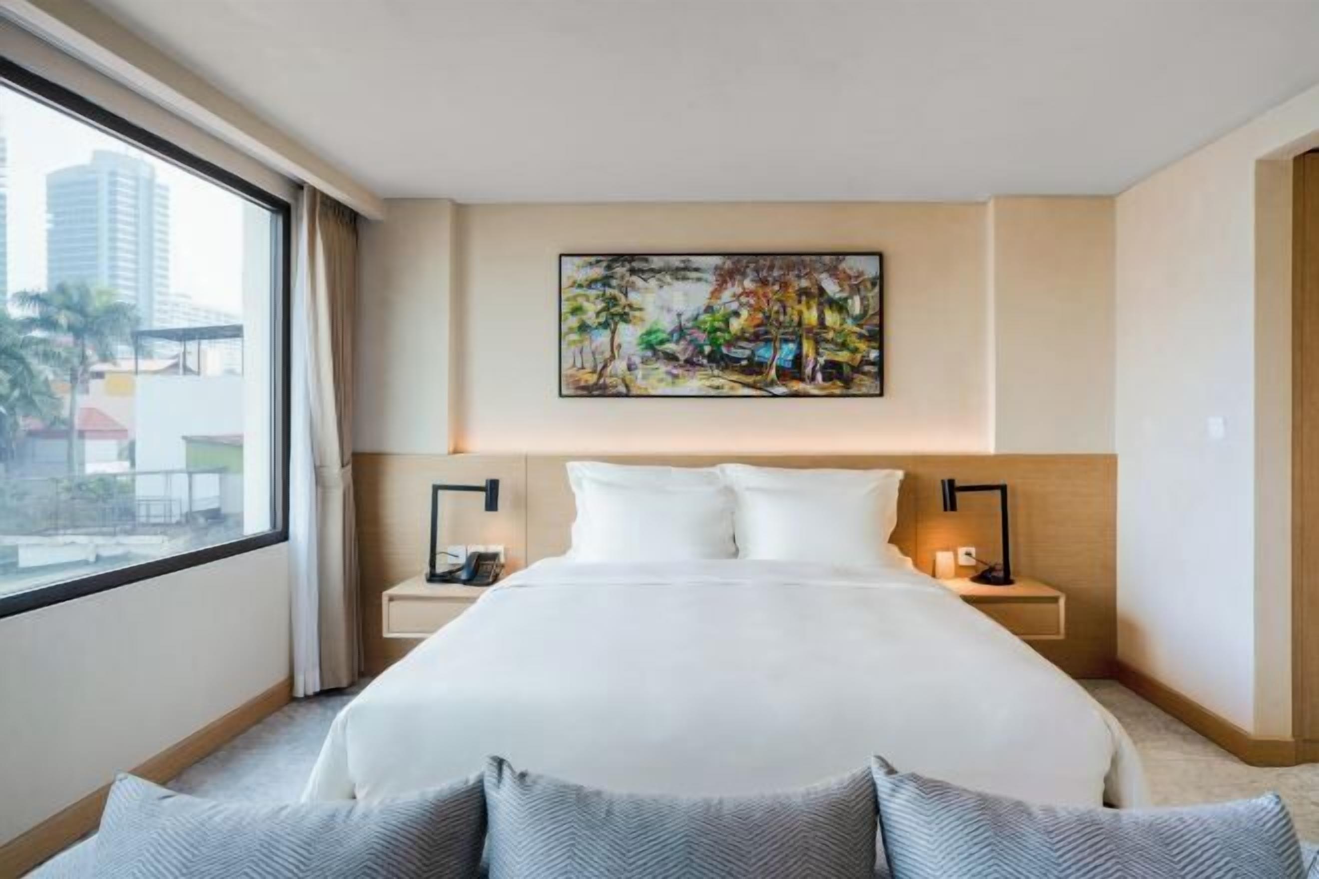 Premium bedding, down comforters, desk, laptop workspace