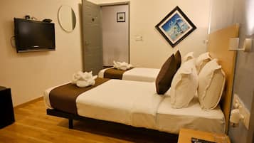 Habitación ejecutiva | 1 dormitorio, tabla de planchar con plancha, wifi gratis