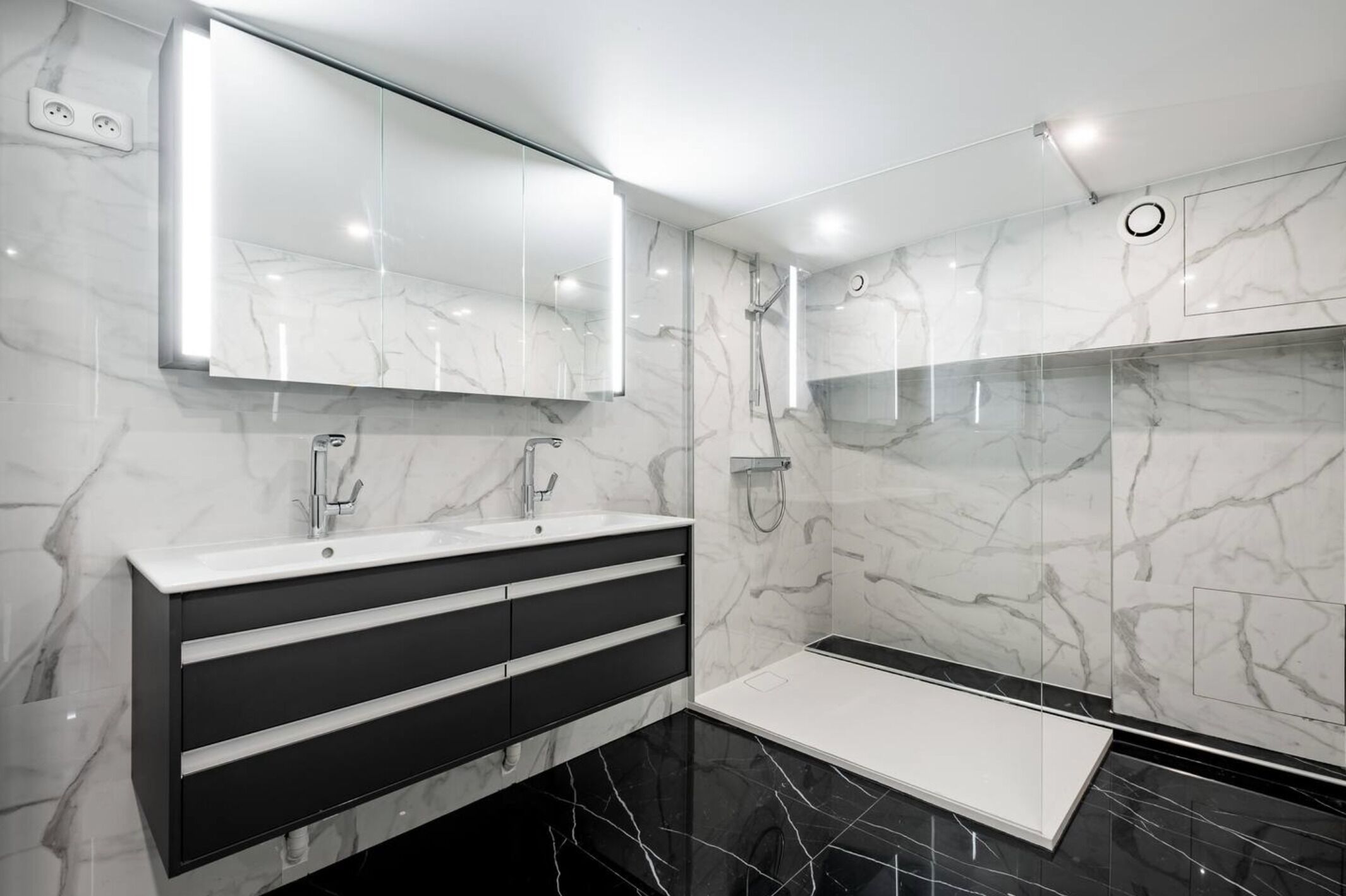 Shower, hair dryer, towels, toilet paper
