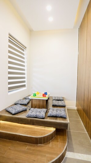 Luxury Room | Living area | TV