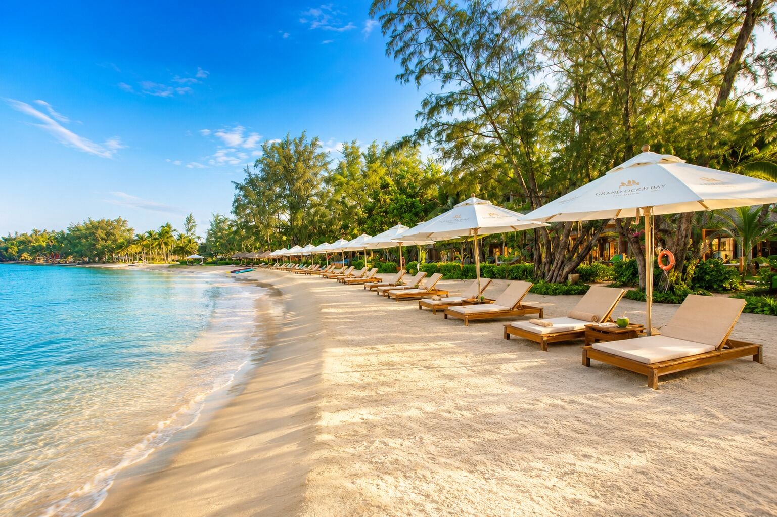 On the beach, sun-loungers, beach umbrellas, beach towels