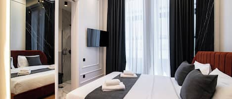 Hypoallergeen beddengoed, een minibar, een kluis op de kamer