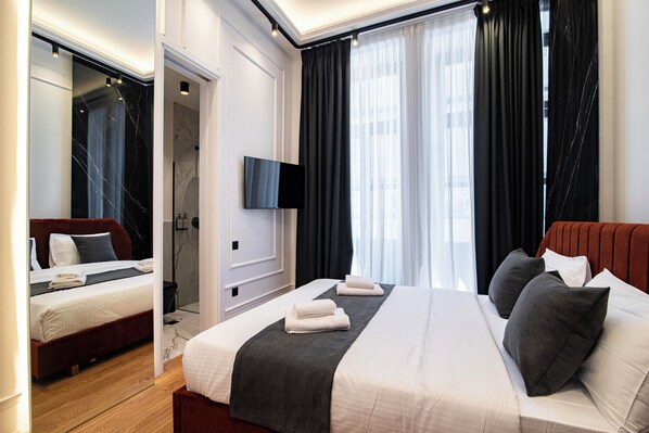 Hypo-allergenic bedding, minibar, in-room safe, individually decorated