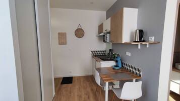 Fridge, microwave, coffee/tea maker, toaster
